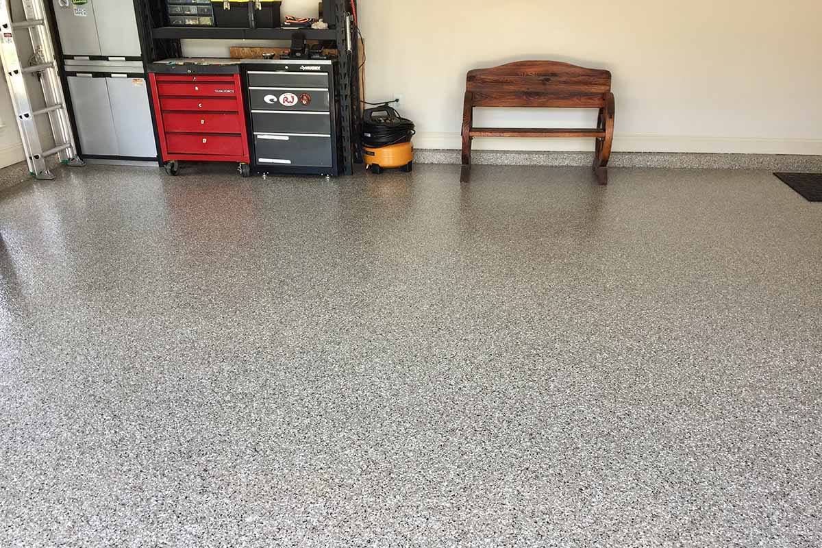 Garage floor coated in Creekbed chips